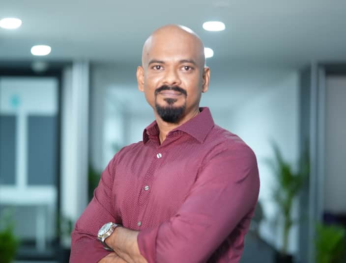 Tekion employee portrait showcasing team culture in automotive cloud solutions