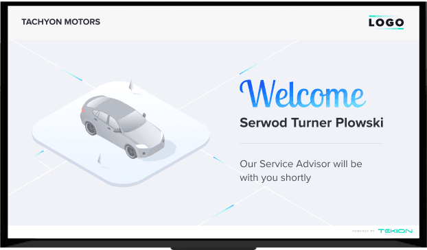Large screen display showing personalized welcome message for arriving customer